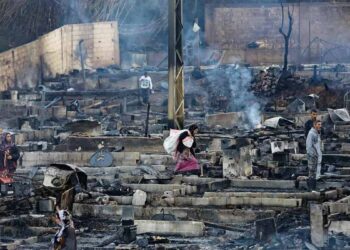 Syrian camp lit ablaze after a dispute