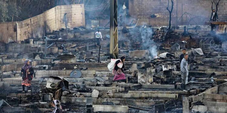 Syrian camp lit ablaze after a dispute