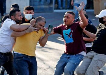 PA forces attack protesters after killing prominent critic