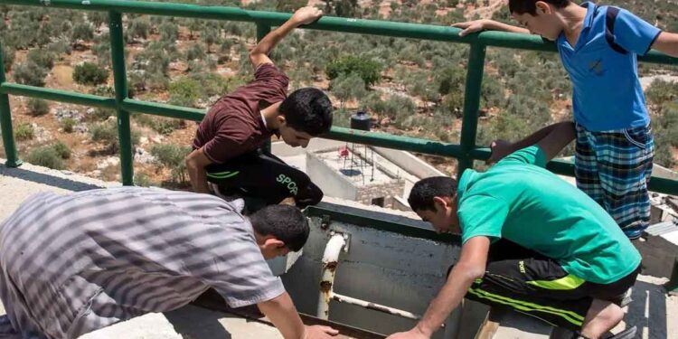 Settlers steal water while Palestinians suffer