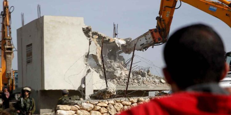 As part of its displacement policy, Israel orders demolition of Palestinian building housing 70 persons