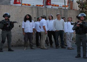 Dozens of Palestinians Injured in an Attack by Settlers and IOF in the West Bank