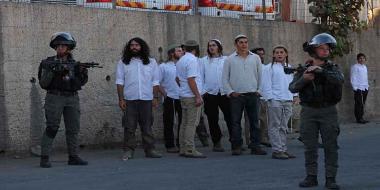 Dozens of Palestinians Injured in an Attack by Settlers and IOF in the West Bank