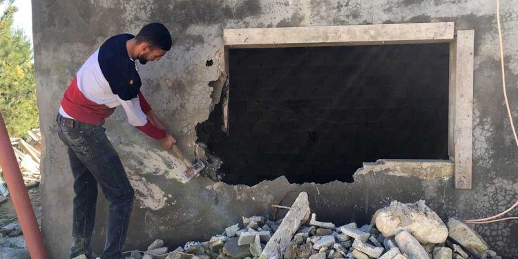 Israeli Occupation Forced Two Palestinian Brothers to Self-Demolish Their Family Houses