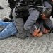 IOF brutally assaults a Palestinian young man before his arrest