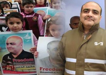 الحكم بالسجن 12 عاماً على الناشط الإغاثي الفلسطيني محمد الحلبي