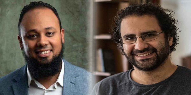 الصحافي والناشط علاء عبدالفتاح ومحاميه محمد الباقر