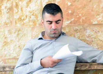 الصحفي أيمن قواريق