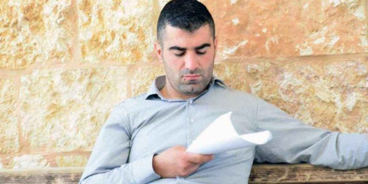 الصحفي أيمن قواريق