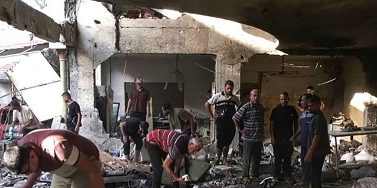 More than 100 killed in a bombing of a school sheltering displaced people in Gaza